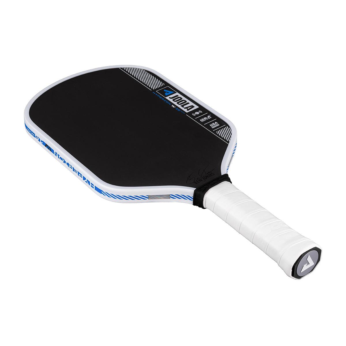 Pickleball bat with black hitting surface, white handle, and blue accents.