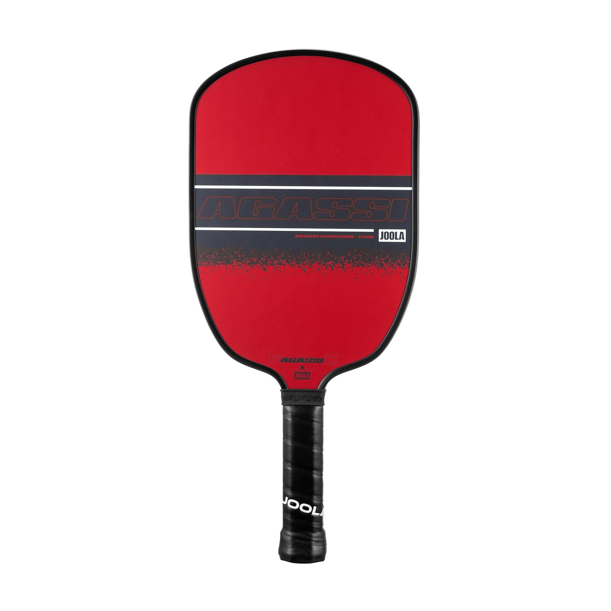 Red Pickleball bat blade with black handle and inscription "AGASSI" and "JOOLA".