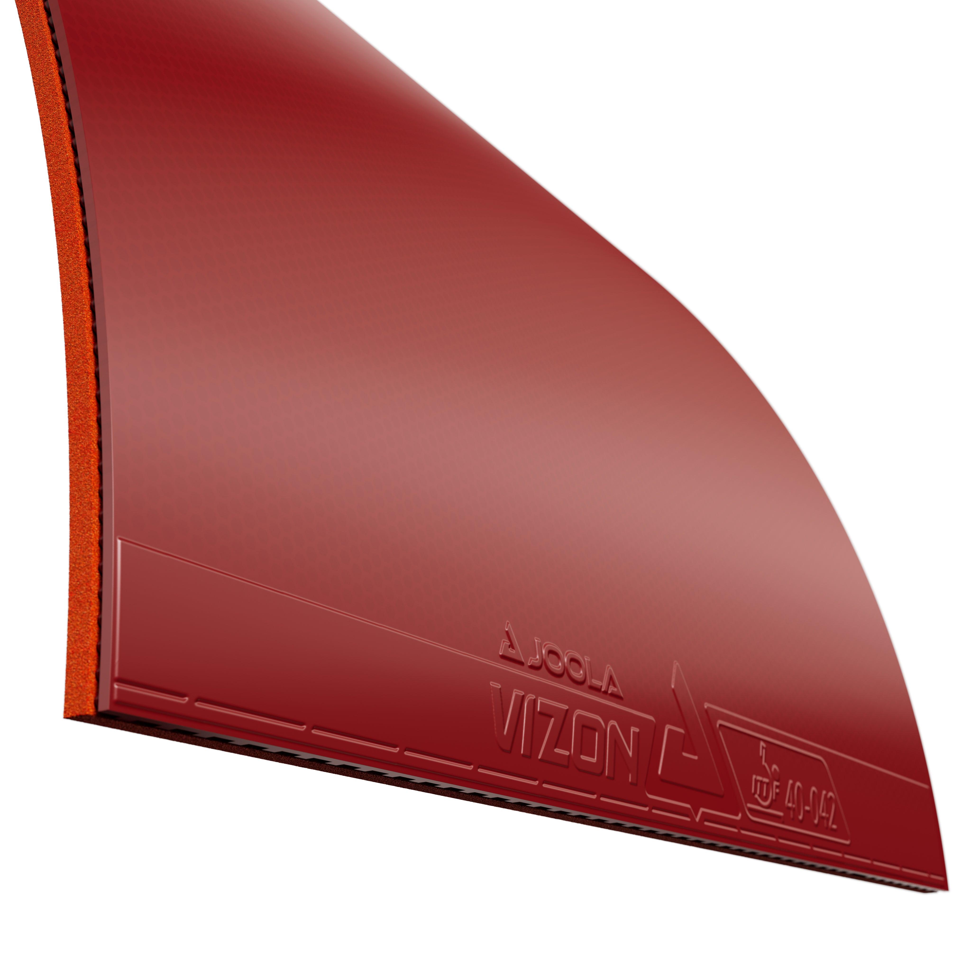 Close-up of red JOOLA Vizon table tennis rubber with orange sponge layer.