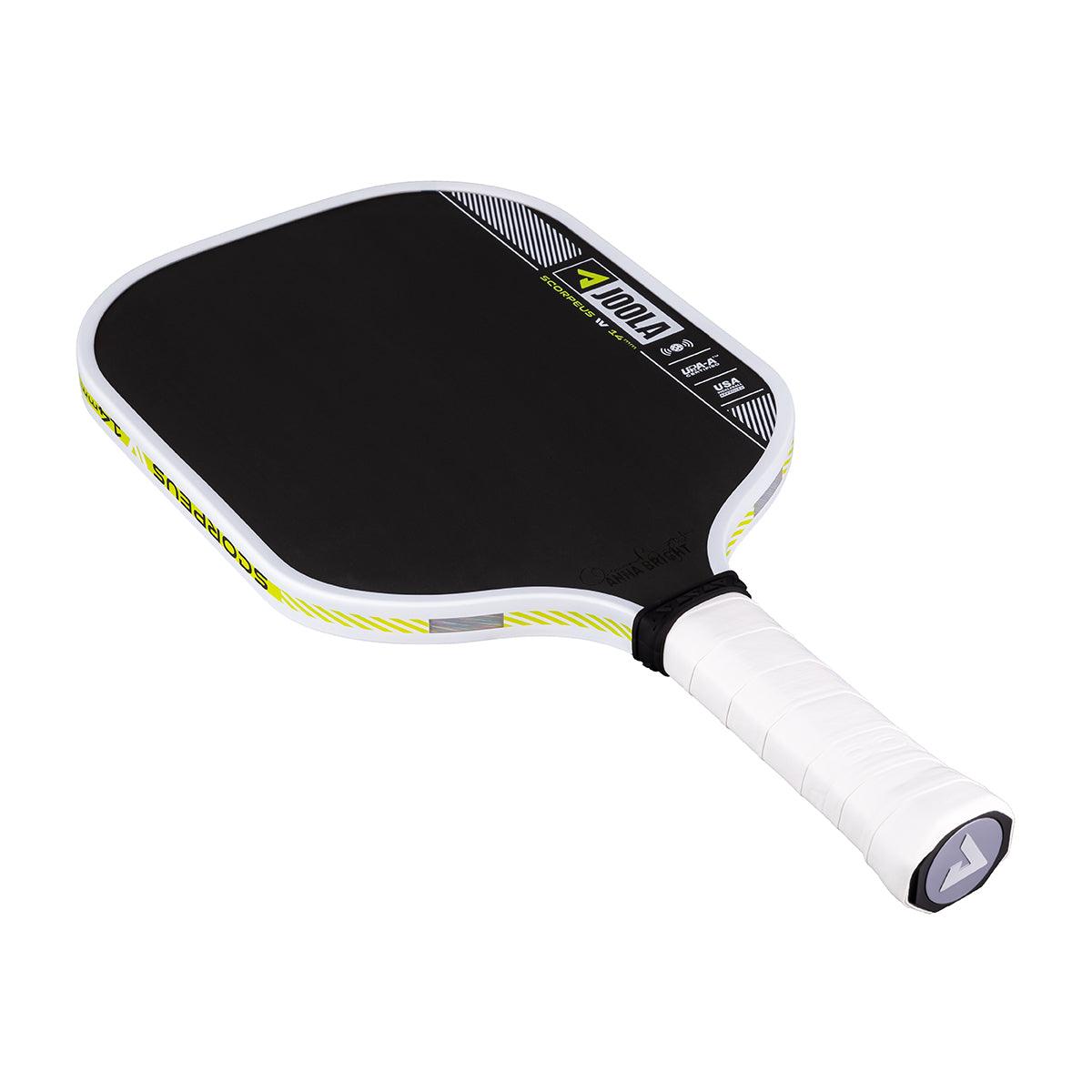 Pickleball bat with black hitting surface and white handle.