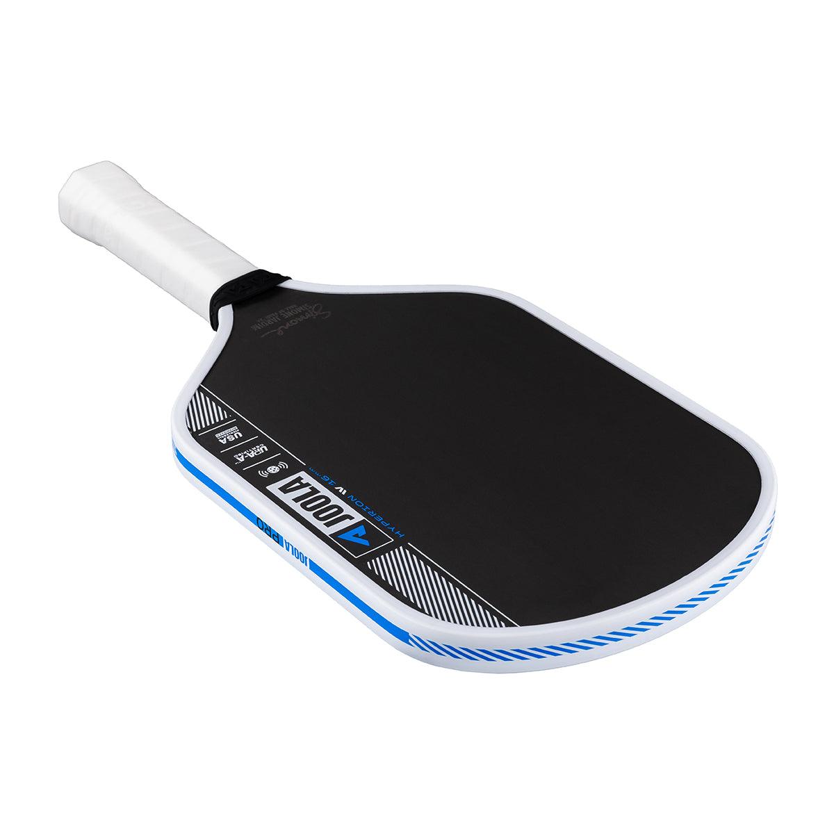 Pickleball bat with black hitting surface, white handle, and blue accents.