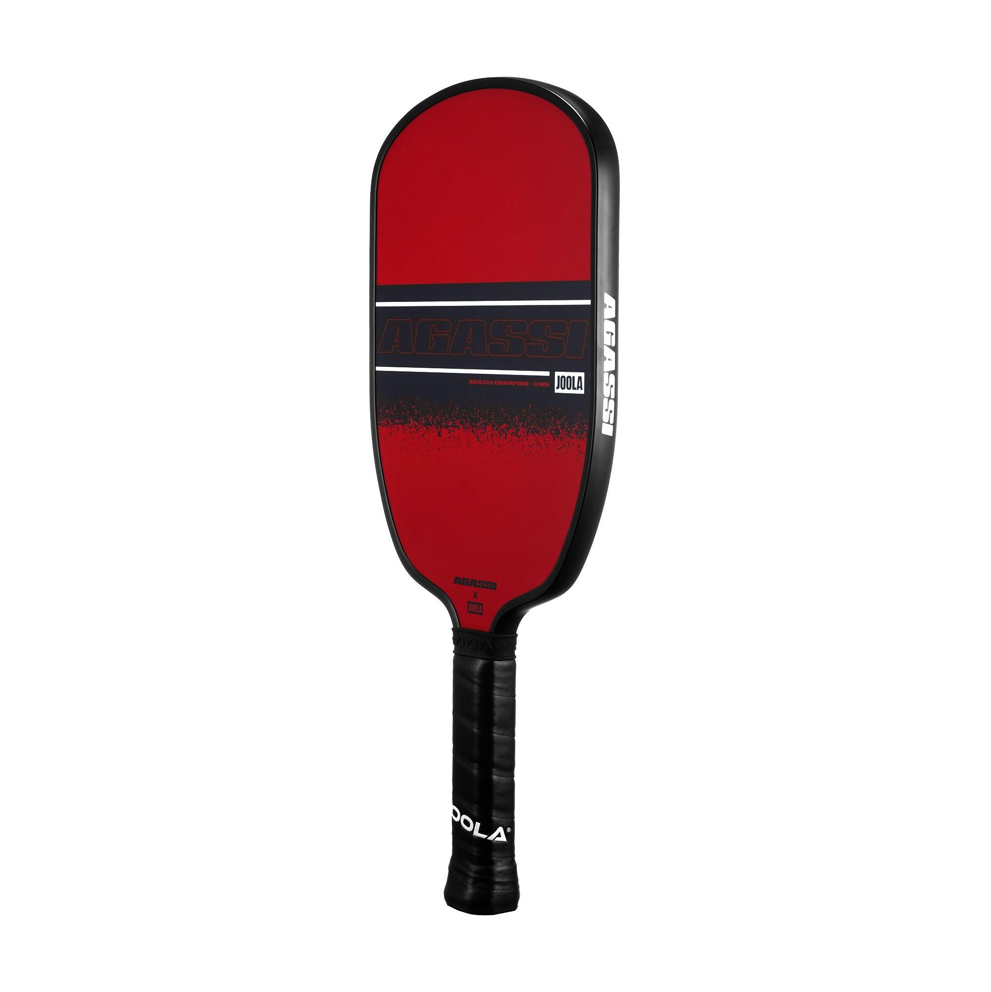 Red Pickleball bat with black handle featuring "Agassi" and "JOOLA".