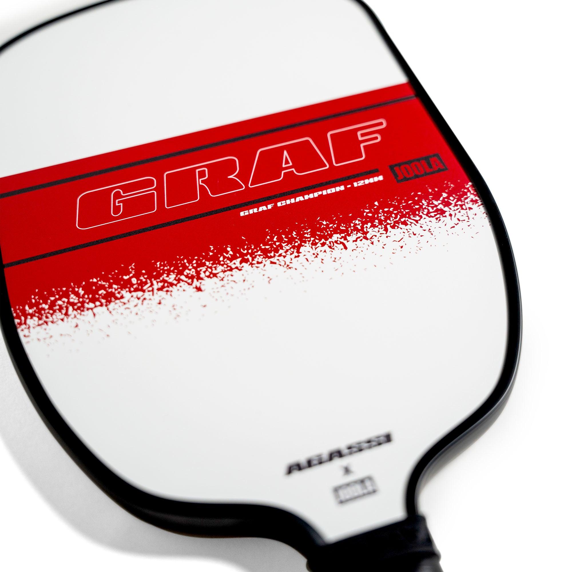 Pickleball bat with white and red design featuring the text "GRAF".