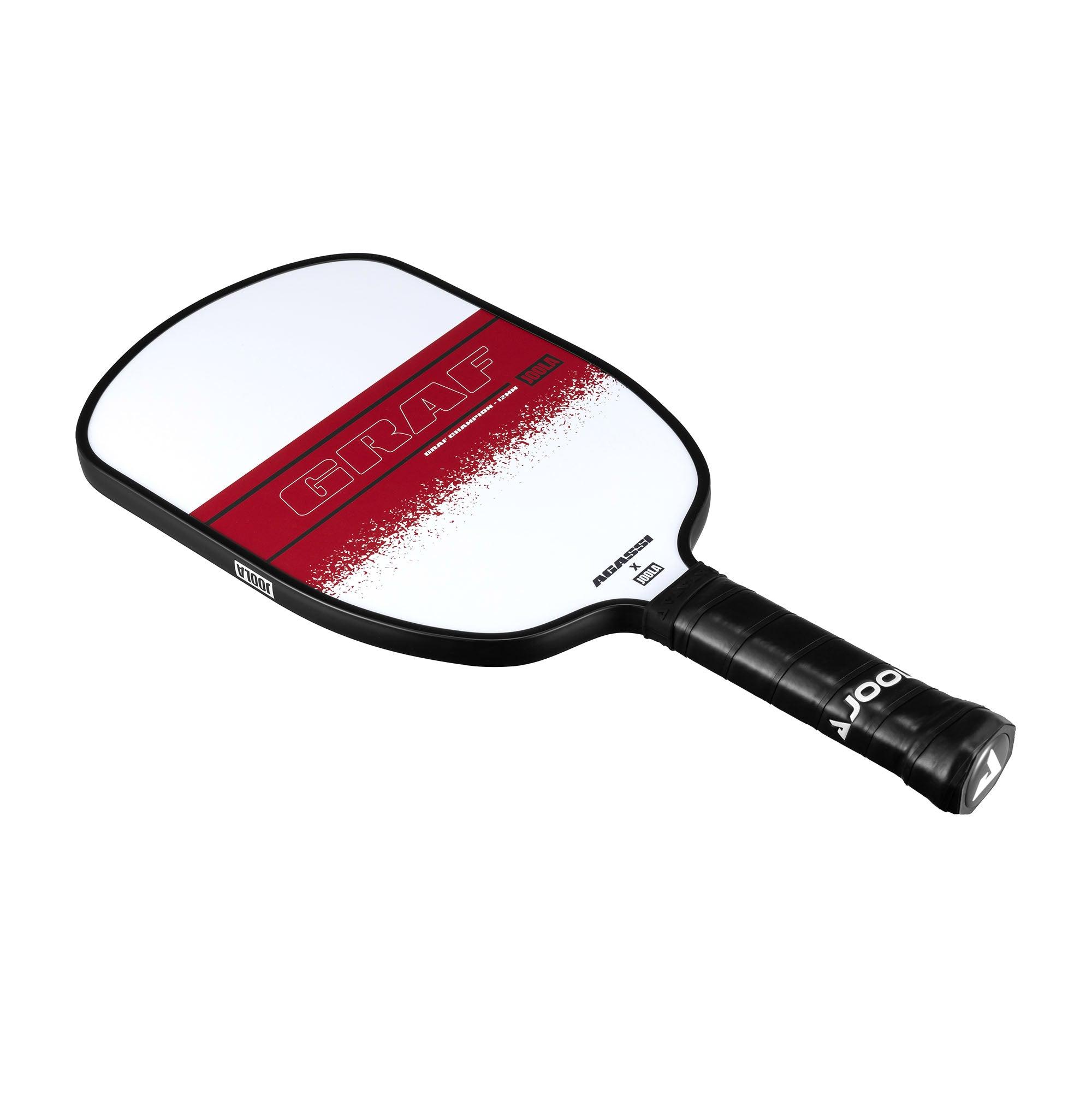 Pickleball bat with white hitting surface, red stripe, and black handle.